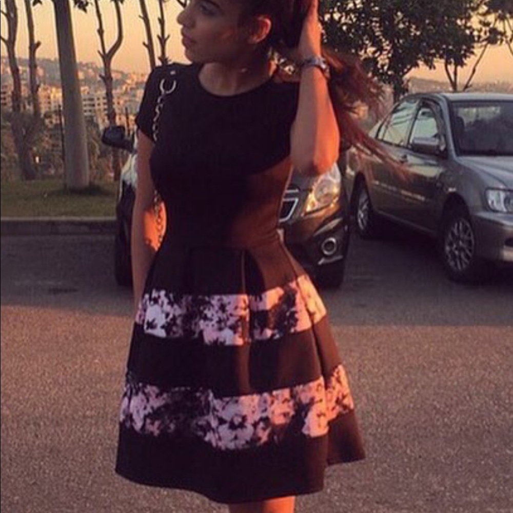 Fit and flare black dress  with a hint of pink 💕